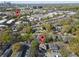 Aerial view of home near the Atlanta Beltline in a tree-lined neighborhood, city skyline in the distance at 808 Dixie Ne Ave, Atlanta, GA 30307