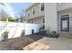 Charming backyard area with a white fence, mulch bed, and space for gardening and outdoor activities at 808 Dixie Ne Ave, Atlanta, GA 30307