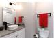 Bright bathroom featuring a modern white vanity, vessel sink, and sleek black fixtures at 808 Dixie Ne Ave, Atlanta, GA 30307