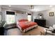 Bright main bedroom with modern decor, including a decorative headboard and matching bedside tables and accents at 808 Dixie Ne Ave, Atlanta, GA 30307