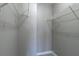 Walk-in closet with gray walls and white shelving at 7432 Battlecreek Ln, Jonesboro, GA 30236