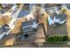 Aerial view of a backyard featuring a wooden fence, a play area, and a partially covered patio at 1191 Fountain Head Ct, Lawrenceville, GA 30043