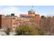 View of Ponce City Market from property with brick facade and rooftop flag at 574 Boulevard Ne Pl # 5, Atlanta, GA 30308