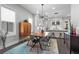 Dining area with modern lighting fixtures and view of kitchen at 574 Boulevard Ne Pl # 5, Atlanta, GA 30308