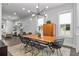 Dining area with modern lighting fixture, view of open floor plan and kitchen at 574 Boulevard Ne Pl # 5, Atlanta, GA 30308