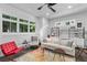 Bright and airy living room with large windows and modern furnishings, complemented by a colorful rug at 574 Boulevard Ne Pl # 5, Atlanta, GA 30308