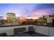 Charming rooftop deck with comfortable seating, offering stunning city views at 574 Boulevard Ne Pl # 5, Atlanta, GA 30308