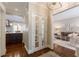 Hallway view into a living room and kitchen with hardwood floors at 78 Paces West Nw Cir, Atlanta, GA 30327