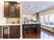 Modern kitchen with an island, stainless steel appliances, and bar seating at 78 Paces West Nw Cir, Atlanta, GA 30327