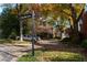 Scenic street view featuring colorful trees and the Paces West Drive street sign at 78 Paces West Nw Cir, Atlanta, GA 30327