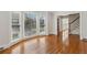 Bright living room featuring hardwood floors and a large bay window with great natural light at 1780 Redbourne Dr, Sandy Springs, GA 30350