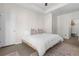 Bedroom featuring neutral décor, plush carpeting, and ample closet space at 375 Highland Ne Ave # 908, Atlanta, GA 30312