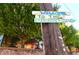 Charming community sign welcomes visitors to the Old Fourth Ward neighborhood with colorful art and greenery at 375 Highland Ne Ave # 908, Atlanta, GA 30312
