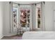 Bedroom bay window providing natural light and treetop views at 375 Highland Ne Ave # 908, Atlanta, GA 30312