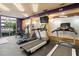Well-equipped gym featuring modern treadmills, elliptical machines, and weight equipment for a complete workout at 390 17Th Nw St # 1063, Atlanta, GA 30363