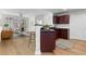 Open kitchen and living area with stainless appliances and hardwood floors, bright and modern at 390 17Th Nw St # 1063, Atlanta, GA 30363