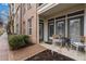 Charming patio with seating, offering a peaceful outdoor space with greenery and garden views at 390 17Th Nw St # 1063, Atlanta, GA 30363