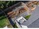 Aerial view of the backyard featuring a seating area, unique landscaping, and custom garden beds at 56 Walthall Ne St, Atlanta, GA 30307