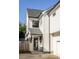 Exterior view of the home featuring the front entrance, balcony, and modern design elements at 56 Walthall Ne St, Atlanta, GA 30307