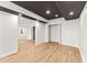 Spacious basement with hardwood flooring, recessed lighting and multiple entryways at 8160 Stone Hill Rd, Cumming, GA 30028