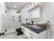 Stylish bathroom with glass enclosed shower, modern vanity and decorative tiling at 8160 Stone Hill Rd, Cumming, GA 30028