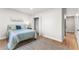 Cozy bedroom with hardwood floors, closet and neutral color scheme at 8160 Stone Hill Rd, Cumming, GA 30028