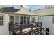 A close-up of the wooden deck showcases detailed craftsmanship, providing an inviting outdoor space with great natural light at 8160 Stone Hill Rd, Cumming, GA 30028