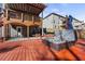 Backyard with a patio and a hot tub providing a relaxing space with neighbors visible in the background at 1617 Matt Springs Dr, Lawrenceville, GA 30045