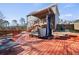 Backyard with a patio and a hot tub providing a relaxing space with trees visible in the background at 1617 Matt Springs Dr, Lawrenceville, GA 30045
