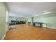Large basement with a pool table, seating area, and a refreshment station for entertaining guests at 1617 Matt Springs Dr, Lawrenceville, GA 30045