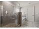 Elegant bathroom with a tiled walk-in shower, a soaking tub, and neutral tiling at 1617 Matt Springs Dr, Lawrenceville, GA 30045