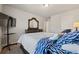 Inviting bedroom featuring TV, dresser and comfortable bedding with plenty of natural light at 1617 Matt Springs Dr, Lawrenceville, GA 30045