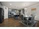 Modern kitchen with stainless steel appliances, center island, and adjoining breakfast area at 1617 Matt Springs Dr, Lawrenceville, GA 30045