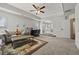Spacious living room with tray ceiling and ample seating at 1617 Matt Springs Dr, Lawrenceville, GA 30045