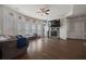 Spacious living room with a fireplace, hardwood floors, and lots of natural light at 1617 Matt Springs Dr, Lawrenceville, GA 30045