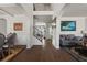 Open-concept living and dining areas featuring hardwood floors and elegant decor at 1617 Matt Springs Dr, Lawrenceville, GA 30045