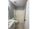 Bathroom with a white single sink vanity and tub/shower combination at 2372 Johnson Rd, Atlanta, GA 30345