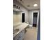Full bathroom featuring a combination shower and bathtub with a long vanity sink at 2372 Johnson Rd, Atlanta, GA 30345
