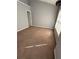 Bedroom featuring plush carpeting, gray walls, large window, and vaulted ceiling at 2372 Johnson Rd, Atlanta, GA 30345
