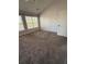 Bedroom with plush carpeting, two large windows, and a vaulted ceiling at 2372 Johnson Rd, Atlanta, GA 30345