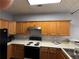 Cozy kitchen features wooden cabinets, white countertops, and modern appliances at 2372 Johnson Rd, Atlanta, GA 30345