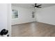 Spacious bedroom with two windows and a ceiling fan at 53 Carrington Lndg, Douglasville, GA 30134