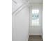 Walk-in closet with wire shelving and natural light at 53 Carrington Lndg, Douglasville, GA 30134