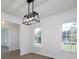 Bright dining area with contemporary lighting, wood-look floors, and an open layout at 53 Carrington Lndg, Douglasville, GA 30134