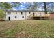 The backyard offers a deck and a spacious yard, perfect for outdoor activities and relaxation at 5539 Andrew Sw Dr, Mableton, GA 30126