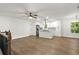Bright, open-concept living area with hardwood floors and modern finishes throughout at 5539 Andrew Sw Dr, Mableton, GA 30126