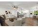 Bright, open-concept living area with hardwood floors and modern finishes throughout at 5539 Andrew Sw Dr, Mableton, GA 30126