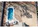 Aerial view of the in-ground pool and backyard with mature trees at 8340 Nolandwood Ln, Villa Rica, GA 30180