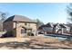 Large backyard with in-ground pool, patio furniture, and privacy fence at 8340 Nolandwood Ln, Villa Rica, GA 30180