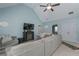 Comfortable living room with vaulted ceilings, a large sectional sofa, TV and neutral decor at 8340 Nolandwood Ln, Villa Rica, GA 30180